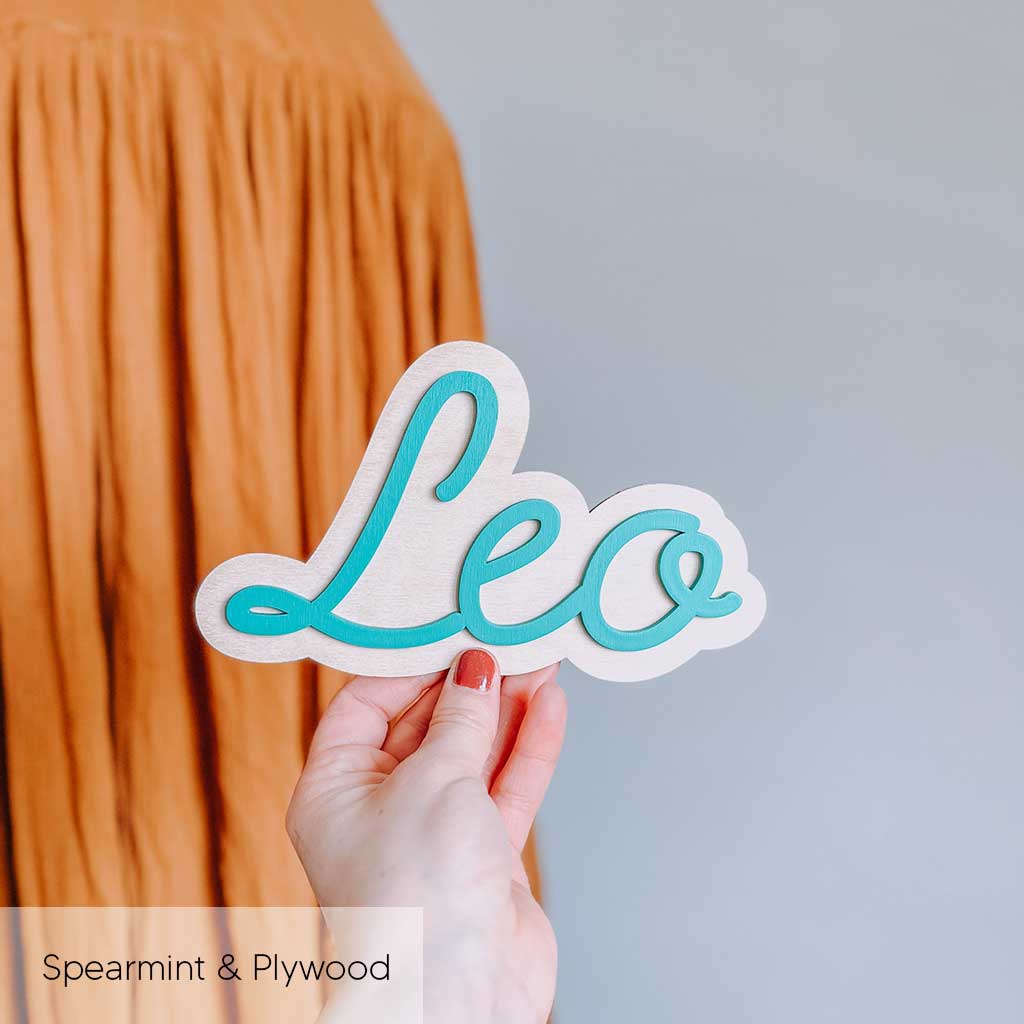 layered wooden wall name personalised green sign