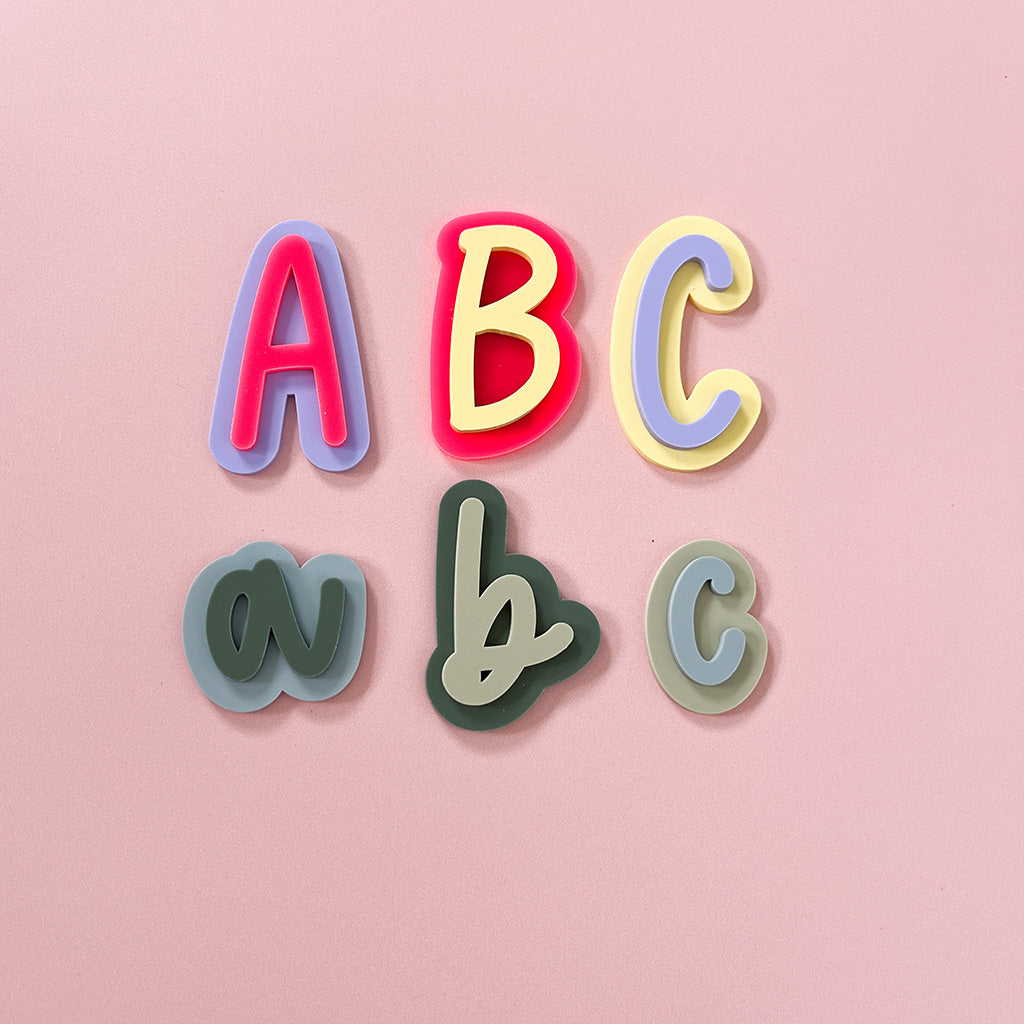 Colourful layered acrylic magnetic letters in uppercase and lowercase styles