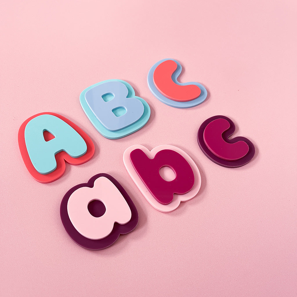 Colourful kids alphabet letter magnets in layered acrylic