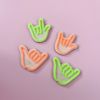 Neon green and orange hand sign wooden wall hooks for a colourful kids bedroom