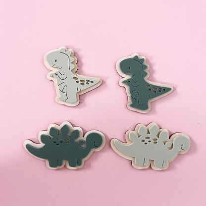 Green dinosaur wooden and acrylic wall hooks for a dinosaur themed children's bedroom