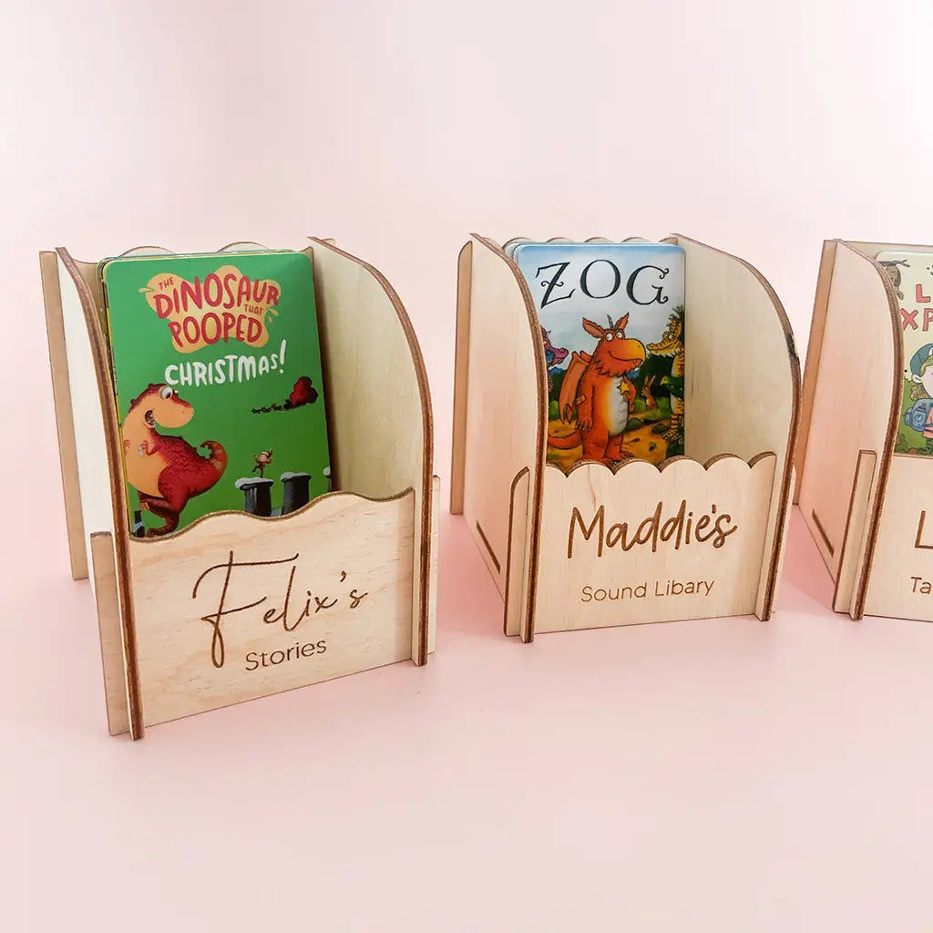 Personalised wooden Yoto card holders showing different engraved name and wording options