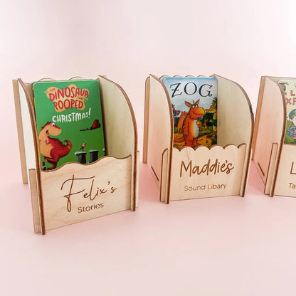 Personalised wooden Yoto card holders showing different engraved name and wording options