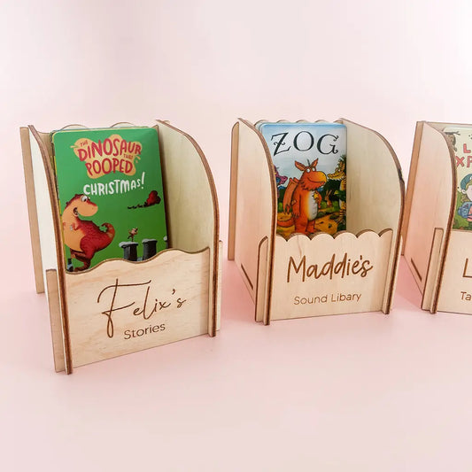 Personalised wooden Yoto card holders showing different engraved name and wording options