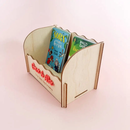 Side view of large wooden Yoto card storage holder showing the deep freestanding design
