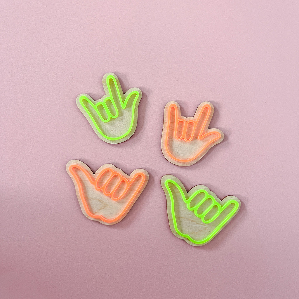 Colourful neon acrylic hand gesture wall hooks with natural wood backing for children's rooms