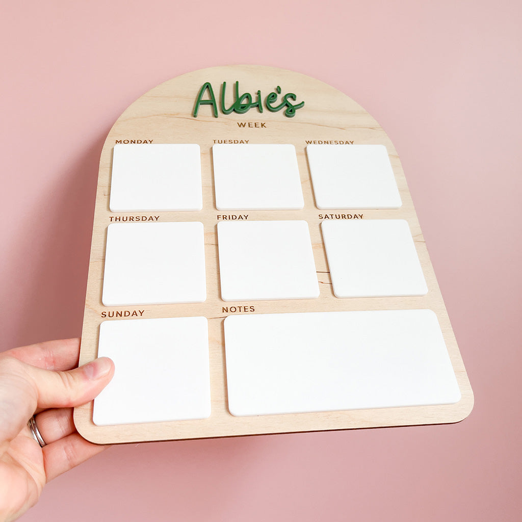 Personalised wooden weekly routine planner for children with reusable wipe-clean sections