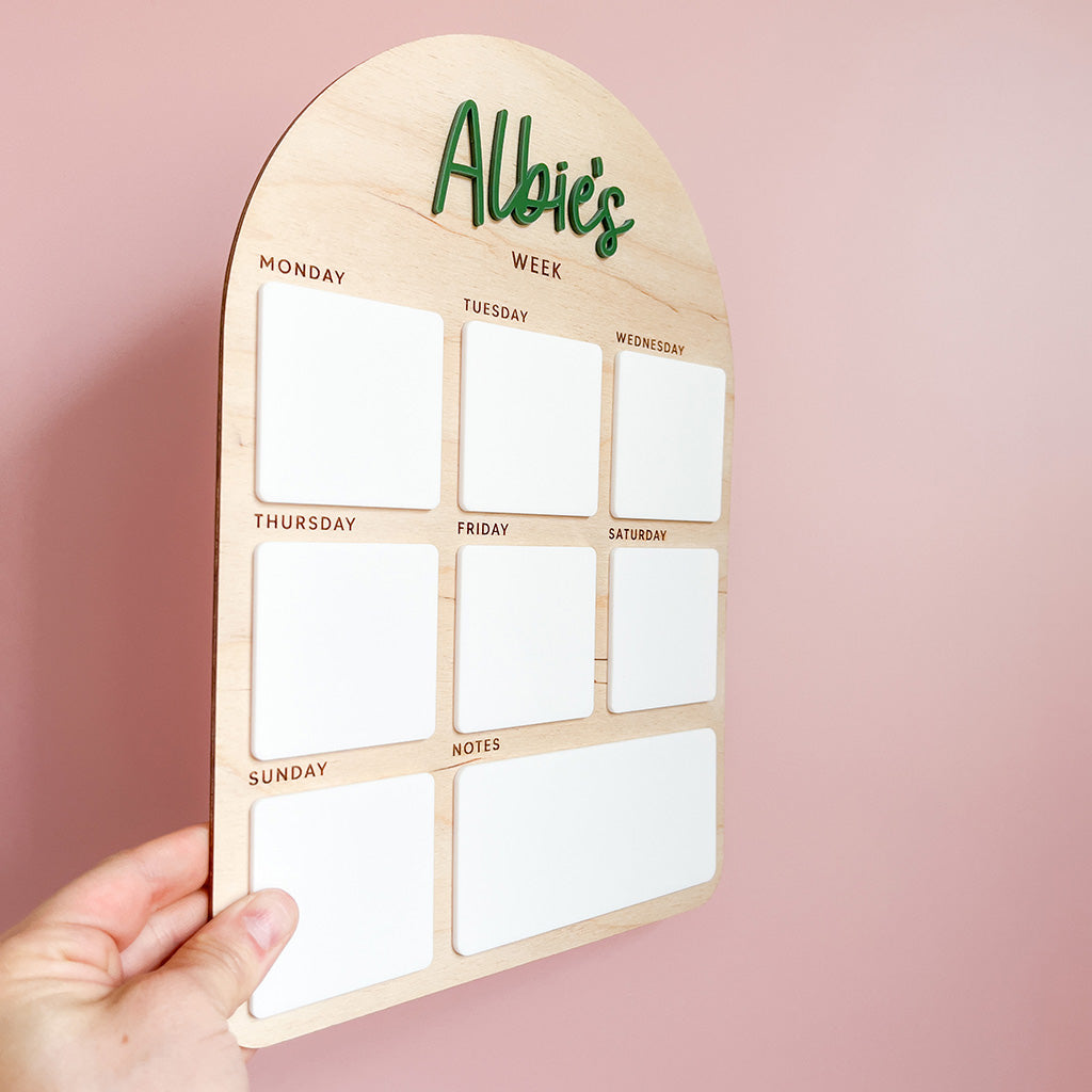 Personalised children’s weekly planner with seven wipe-clean day sections and notes area