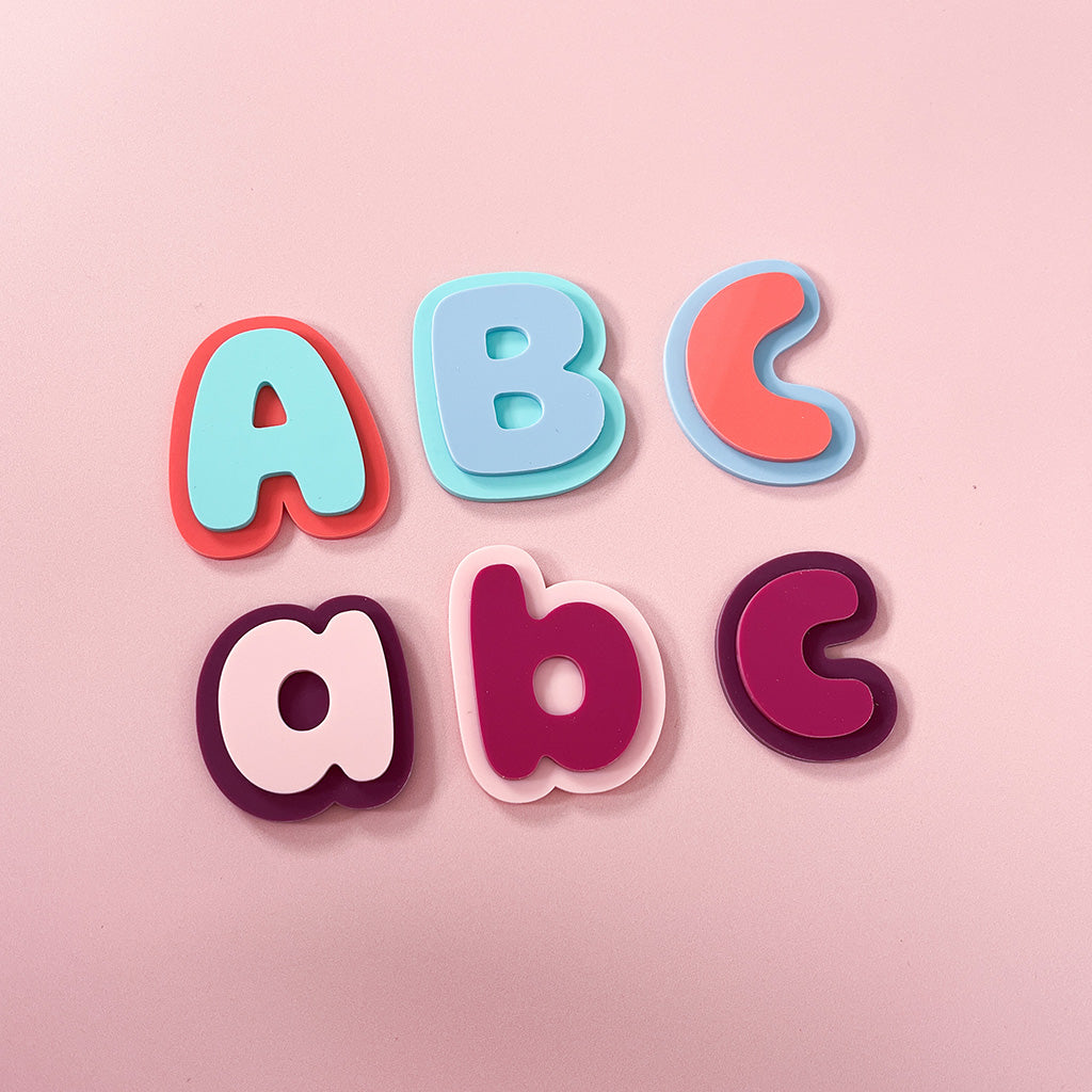 Chunky colourful acrylic alphabet magnets featuring uppercase and lowercase letters