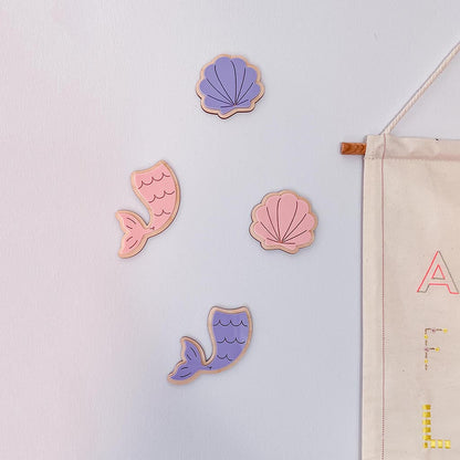Wooden mermaid tail and seashell wall decor in pink and purple