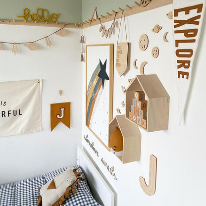 Wooden planets, moons and space wall decor in a child's bedroom
