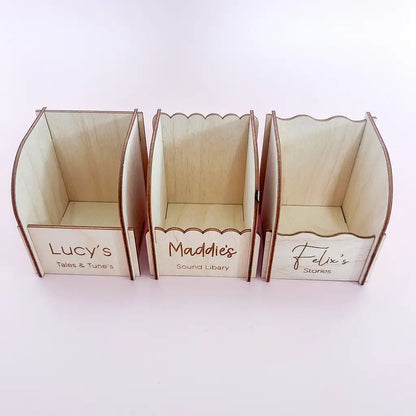 Overhead view of personalised wooden Yoto card holders showing storage space for children’s audio cards